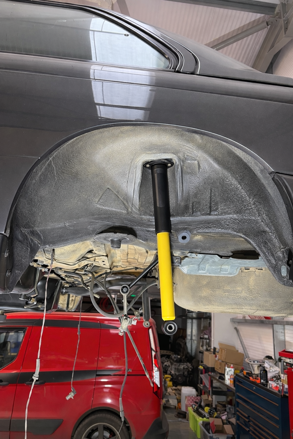 Car wheel arch and suspension components after dry ice blasting