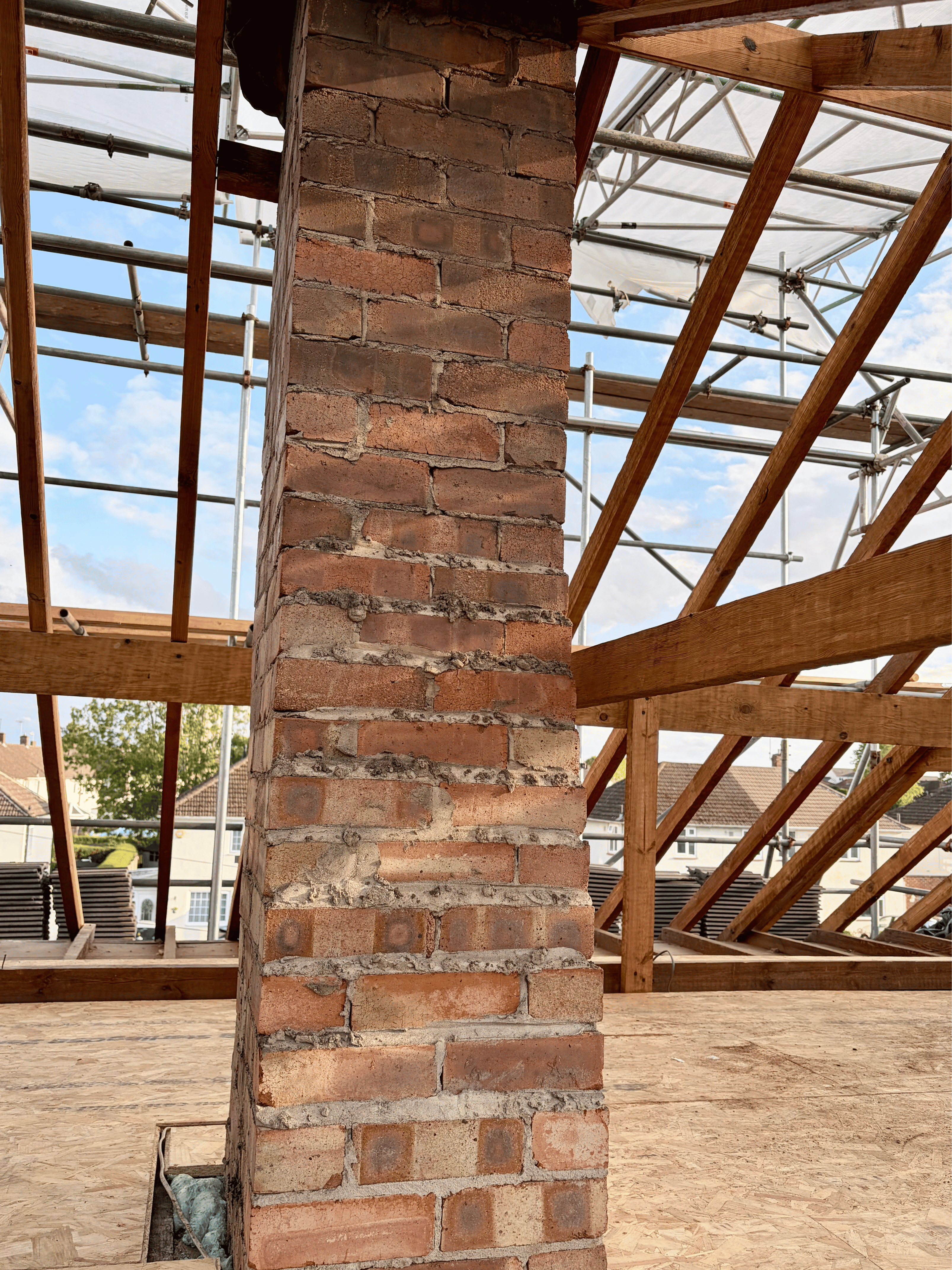 Fire and soot damaged chimney stack brickwork after dry ice blasting 