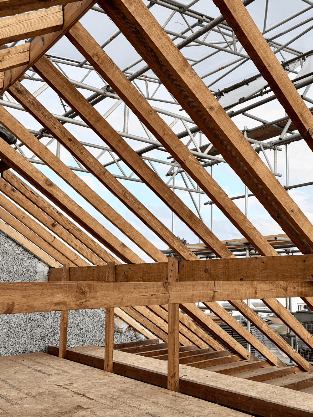 Fire, smoke and soot damaged roof timbers after dry ice blasting