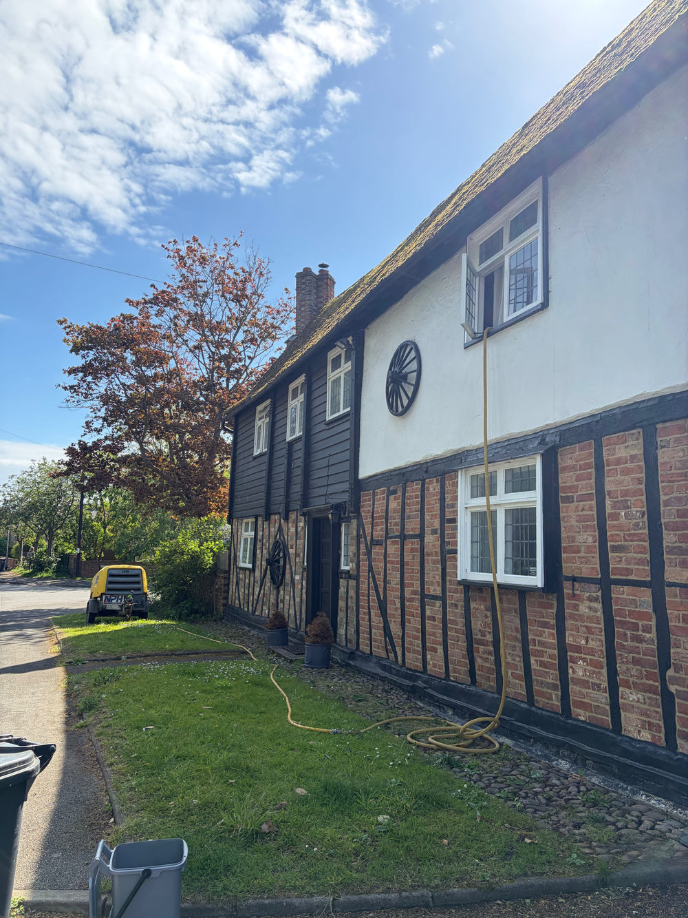 Period property with air compressor and dry ice blasting preparations outside