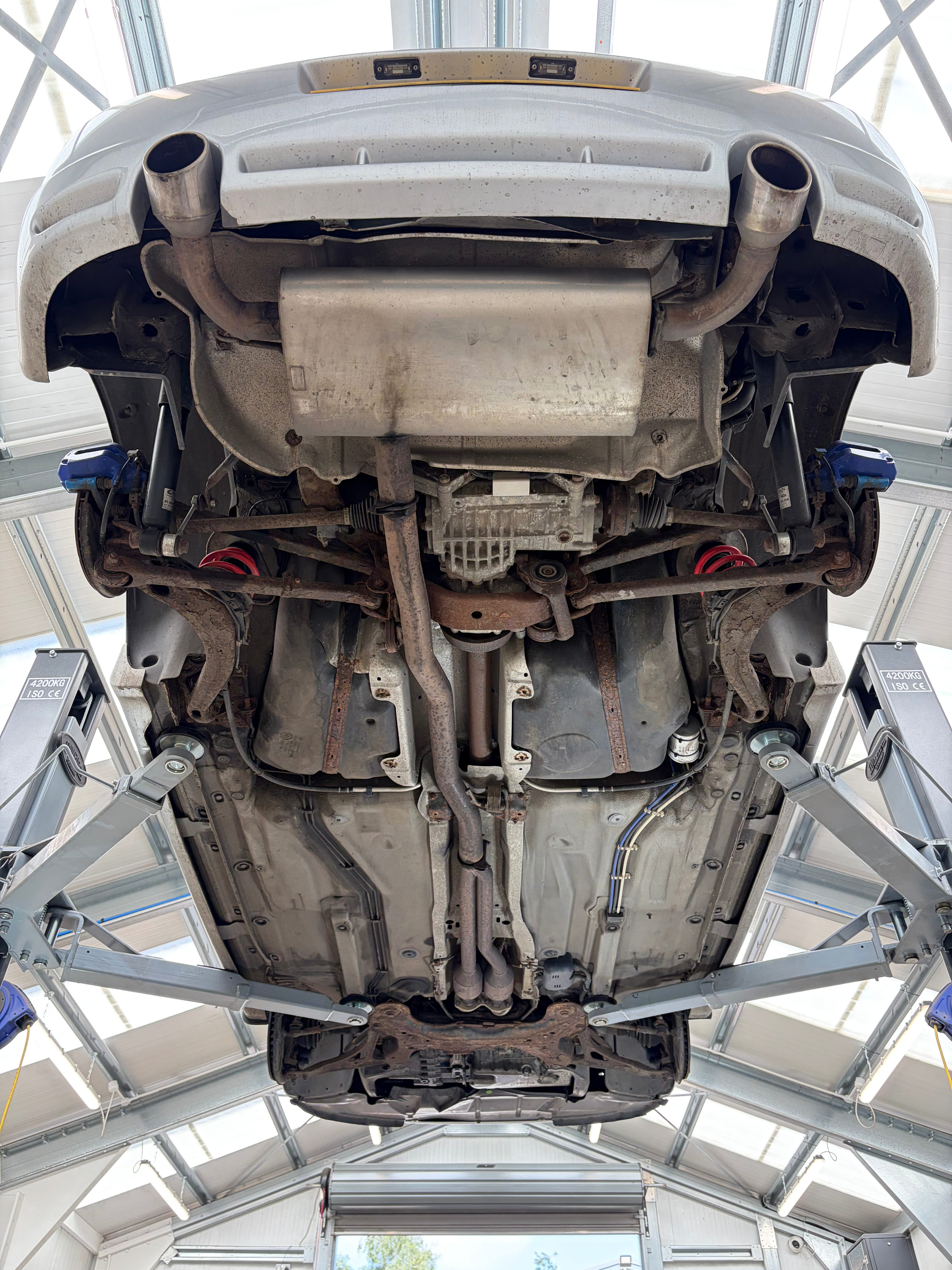 Golf R32 underbody on lift before dry ice blasting