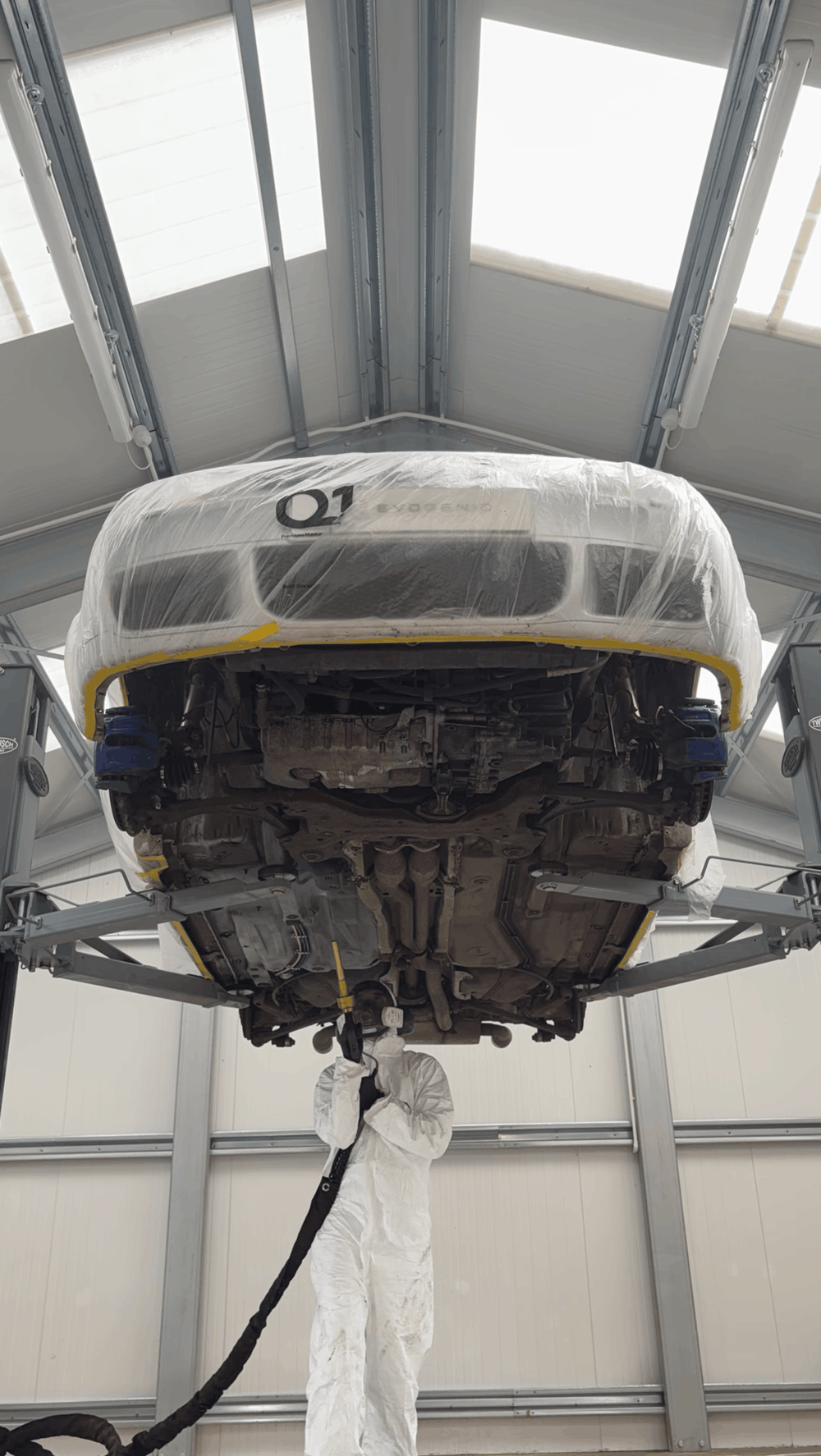 VW R32 getting dry ice blasting on a lift 
